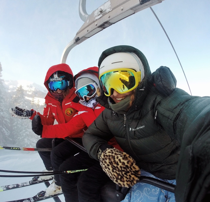 Skiers on a chair lift