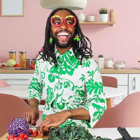 Lazarus Lynch chopping vegetables